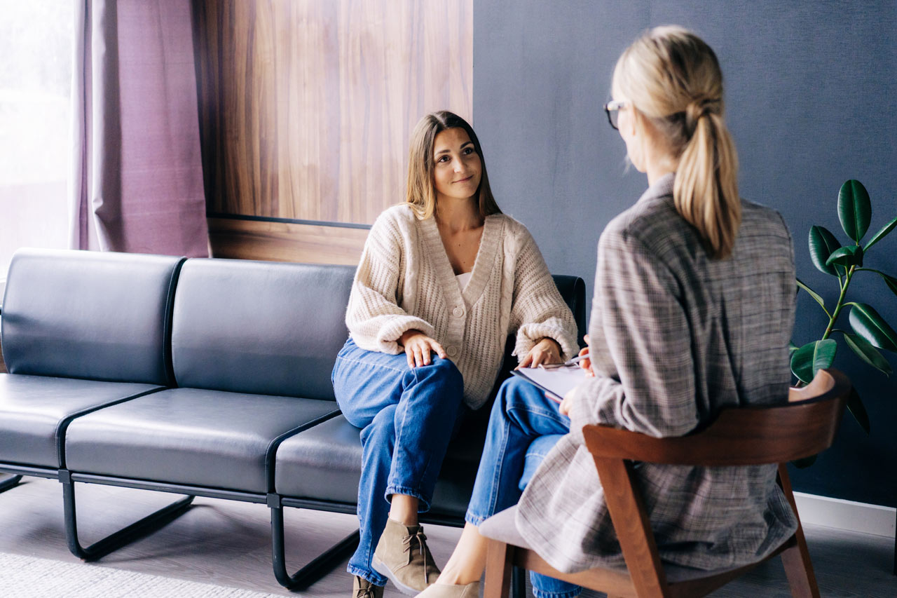 New Roads Behavioral Health | Understanding Codependency Young female client in a counseling session with a licensed therapist