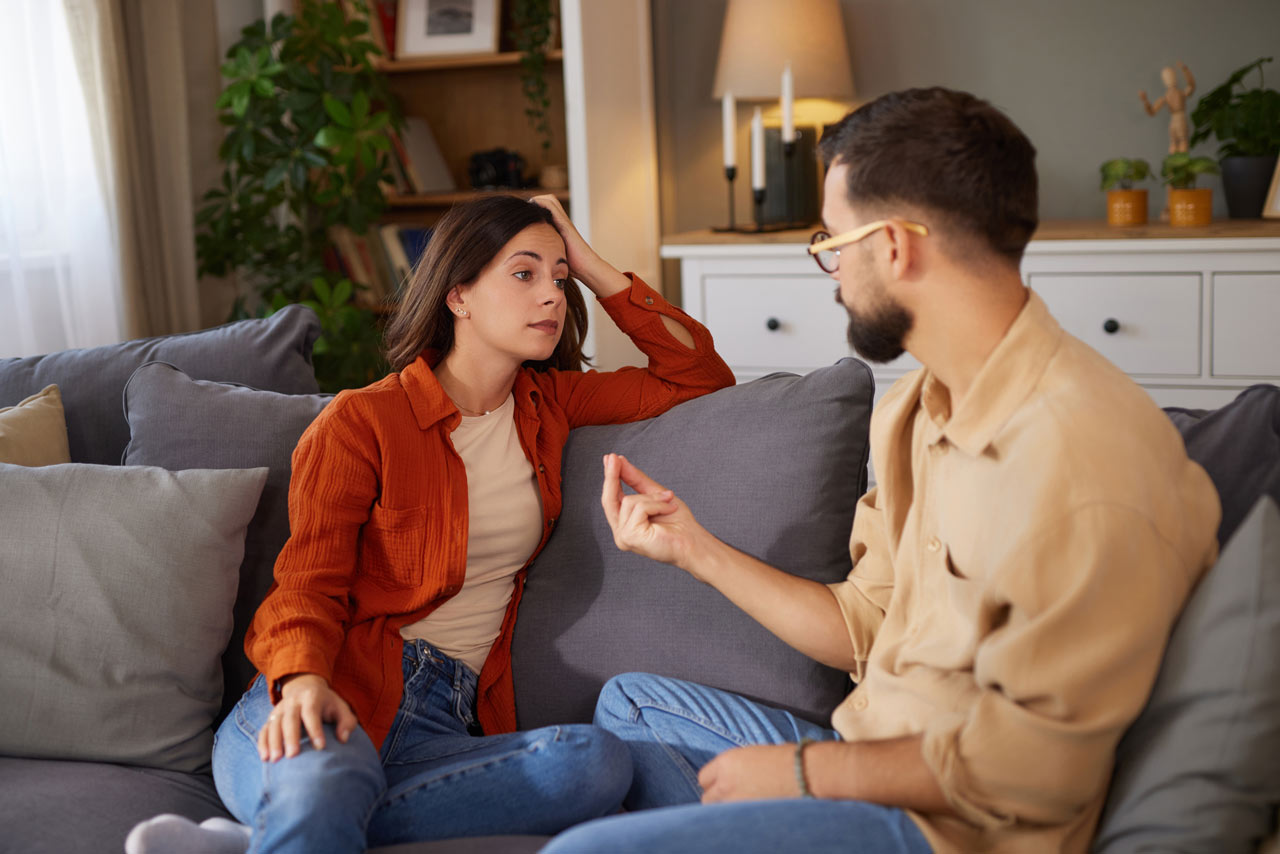 New Roads Behavioral Health | Understanding Codependency A man and a woman in a romantic relationship struggling to resolve a disagreement